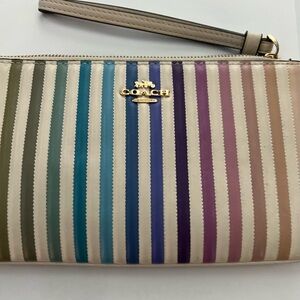 Authentic leather Coach Wristlet size in pics